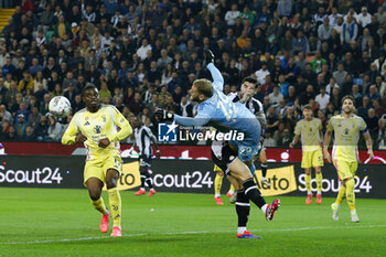 2024-11-02 - Michele Di Gregorio of Juventus FC makes a save on Florian Thauvin of Udinese FC during Udinese Calcio vs Juventus FC, 11° Serie A Enilive 2024-25 game at Bluenergy stadium in Udine (UD), Italy, on November 02, 2024. - UDINESE CALCIO VS JUVENTUS FC - ITALIAN SERIE A - SOCCER