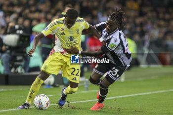 2024-11-02 - Timothy Weah of Juventus FC battle for the ball with Jordan Zemura of Udinese FC during Udinese Calcio vs Juventus FC, 11° Serie A Enilive 2024-25 game at Bluenergy stadium in Udine (UD), Italy, on November 02, 2024. - UDINESE CALCIO VS JUVENTUS FC - ITALIAN SERIE A - SOCCER