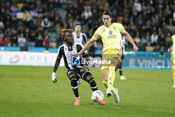 2024-11-02 - Dusan Vlahovic of Juventus FC battle for the ball with Jordan Zemura of Udinese FC during Udinese Calcio vs Juventus FC, 11° Serie A Enilive 2024-25 game at Bluenergy stadium in Udine (UD), Italy, on November 02, 2024. - UDINESE CALCIO VS JUVENTUS FC - ITALIAN SERIE A - SOCCER