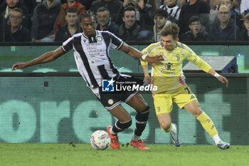 2024-11-02 - Francisco Conceicao of Juventus FC battle for the ball with Kingsley Ehizibue of Udinese FC during Udinese Calcio vs Juventus FC, 11° Serie A Enilive 2024-25 game at Bluenergy stadium in Udine (UD), Italy, on November 02, 2024. - UDINESE CALCIO VS JUVENTUS FC - ITALIAN SERIE A - SOCCER