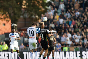 2024-10-20 - Venezia’s Christian Gytkjaer in action against Atalanta’s Berat Djimsiti during the Italian Serie A soccer championship football match between Venezia FC and Atalanta BC at Pierluigi Penzo Stadium on October 20th, 2024, Venezia, Italy - VENEZIA FC VS ATALANTA BC - ITALIAN SERIE A - SOCCER