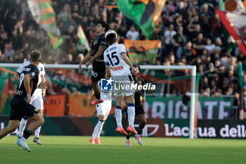 2024-10-20 - Atalanta’s Marten De Roon in action against Venezia’s Saad El Haddad during the Italian Serie A soccer championship football match between Venezia FC and Atalanta BC at Pierluigi Penzo Stadium on October 20th, 2024, Venezia, Italy - VENEZIA FC VS ATALANTA BC - ITALIAN SERIE A - SOCCER