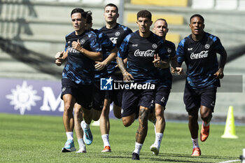 2024-07-26 - SSC Napoli's Italian defender Alessandro Buongiorno, Napoli's Italian midfielder Michael Folorunsho, Napoli's Georgian forward Khvicha Kvaratskhelia, Napoli's Slovak midfielder Stanislav Lobotka, SSC Napoli's Italian forward Giacomo Raspadori and Napoli's Italian defender Giovanni Di Lorenzo during SSC Napoli's 2024-25 preseason training camp in Castel Di Sangro, Abruzzo, Italy. - NAPOLI - PRESS CONFERENCE AND TRAINING - ITALIAN SERIE A - SOCCER