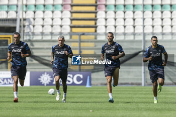 2024-07-26 - Napoli's Italian defender Francesco Mezzoni, Napoli's Italian defender Pasquale Mazzocchi, Napoli's Italian defender Leonardo Spinazzola and Napoli's Moroccan forward Walid Cheddira during SSC Napoli's 2024-25 preseason training camp in Castel Di Sangro, Abruzzo, Italy. - NAPOLI - PRESS CONFERENCE AND TRAINING - ITALIAN SERIE A - SOCCER