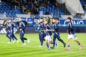 2024-10-31 - Como 1907 warms up prior to the Soccer - Italian ,Serie A - Como 1907 vs S.S.Lazio, 2024-25 game at Stadio Giuseppe Sinigaglia in Como (CO), Italy, 31.10.2024. Photo by Marius Bunduc/LiveMedia - COMO 1907 VS SS LAZIO - ITALIAN SERIE A - SOCCER