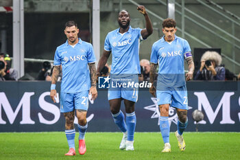 2024-10-29 - Romelu LUKAKU of Napoli celebrate his goal with Matteo POLITANO of Napoli and Giovanni DI LORENZO of Napoli during the Italian championship Serie A football match between AC Milan and SSC Napoli on 29 October 2024 at San Siro stadium in Milan, Italy - FOOTBALL - ITALIAN CHAMP - MILAN V NAPOLI - ITALIAN SERIE A - SOCCER