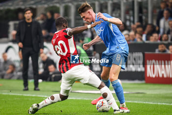 2024-10-29 - Yunus MUSAH of AC Milan and Scott MCTOMINAY of Napoli during the Italian championship Serie A football match between AC Milan and SSC Napoli on 29 October 2024 at San Siro stadium in Milan, Italy - FOOTBALL - ITALIAN CHAMP - MILAN V NAPOLI - ITALIAN SERIE A - SOCCER