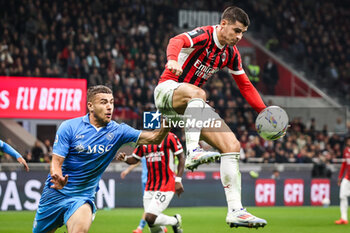 2024-10-29 - Alessandro BUONGIORNO of Napoli and Alvaro MORATA of AC Milan during the Italian championship Serie A football match between AC Milan and SSC Napoli on 29 October 2024 at San Siro stadium in Milan, Italy - FOOTBALL - ITALIAN CHAMP - MILAN V NAPOLI - ITALIAN SERIE A - SOCCER