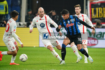 2024-10-30 - Raoul Bellanova (Atalanta BC) and Luca Caldirola (AC Monza) during the Italian championship Serie A football match between Atalanta BC and AC Monza on 30 October 2024 at Gewiss Stadium in Bergamo, Italy - ATALANTA VS MONZA - ITALIAN SERIE A - SOCCER