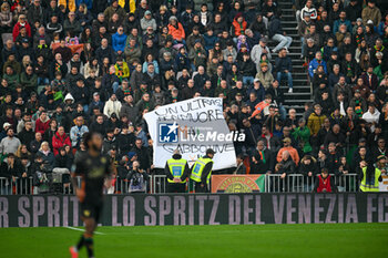 2024-11-09 - Venezia Football Club fans hold sign for 