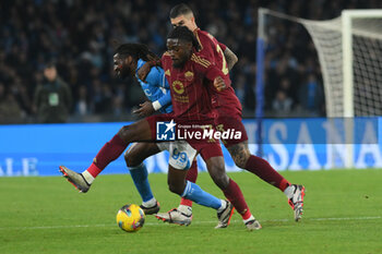 2024-11-24 - Manu Kone of AS Roma competes for the ball with Andre Frank Zambo Anguissa of SSC Napoli during the Serie A Enilive between SSC Napoli vs AS Roma at Diego Armando Maradona Stadium - SSC NAPOLI VS AS ROMA - ITALIAN SERIE A - SOCCER