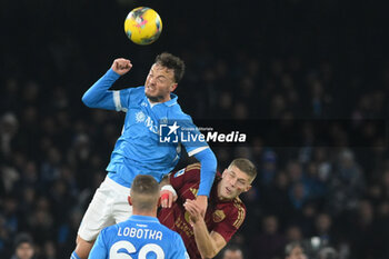 2024-11-24 - Amir Rrahmani of SSC Napoli competes for the ball with Artem Dovbyk of AS Roma during the Serie A Enilive between SSC Napoli vs AS Roma at Diego Armando Maradona Stadium - SSC NAPOLI VS AS ROMA - ITALIAN SERIE A - SOCCER