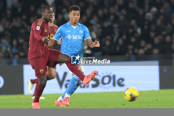 2024-11-24 - David Neres of SSC Napoli competes for the ball with Evan Ndicka of AS Roma during the Serie A Enilive between SSC Napoli vs AS Roma at Diego Armando Maradona Stadium - SSC NAPOLI VS AS ROMA - ITALIAN SERIE A - SOCCER