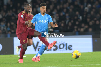 2024-11-24 - David Neres of SSC Napoli competes for the ball with Evan Ndicka of AS Roma during the Serie A Enilive between SSC Napoli vs AS Roma at Diego Armando Maradona Stadium - SSC NAPOLI VS AS ROMA - ITALIAN SERIE A - SOCCER