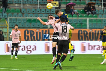 2024-01-20 - Thomas Battistella (Modena F.C.) in action against Ionut Nedelcearu (Palermo F.C.) during the Italian Serie BKT match between Palermo F.C. vs Modena F.C. 2018 on 20 January 2024 at the Renzo Barbera stadium in Palermo, Italy - PALERMO FC VS MODENA FC - ITALIAN SERIE B - SOCCER
