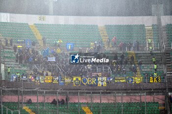2024-01-20 - Modena F.C. supporters under the rain during the Italian Serie BKT match between Palermo F.C. vs Modena F.C. 2018 on 20 January 2024 at the Renzo Barbera stadium in Palermo, Italy - PALERMO FC VS MODENA FC - ITALIAN SERIE B - SOCCER