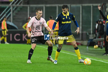 2024-01-20 - Luca Tremolada (Modena F.C) in action against Francesco Di Mariano (Palermo F.C.) during the Italian Serie BKT match between Palermo F.C. vs Modena F.C. 2018 on 20 January 2024 at the Renzo Barbera stadium in Palermo, Italy - PALERMO FC VS MODENA FC - ITALIAN SERIE B - SOCCER