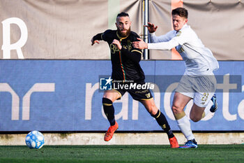 2024-02-18 - Francesco Zampano (Venezia) and Thomas Battistella (Modena) - VENEZIA FC VS MODENA FC - ITALIAN SERIE B - SOCCER