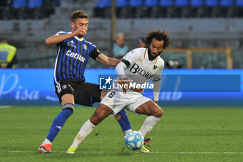 2024-02-24 - Gianluca Busio (Venezia) thwarted by Simone Canestrelli (Pisa) - PISA SC VS VENEZIA FC - ITALIAN SERIE B - SOCCER