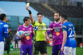 2024-02-24 - Collu Giuseppe (Referee) shows the yellow card - BRESCIA CALCIO VS AC REGGIANA - ITALIAN SERIE B - SOCCER