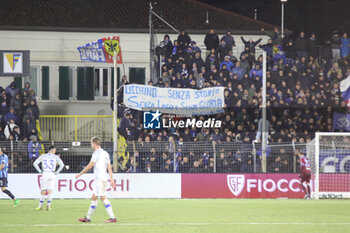 2024-02-27 - Fans of Como with a banner during the Serie BKT match between Lecco and Como at Stadio Mario Rigamonti-Mario Ceppi on February 27, 2024 in Lecco, Italy.
(Photo by Matteo Bonacina/LiveMedia) - LECCO 1912 VS COMO 1907 - ITALIAN SERIE B - SOCCER