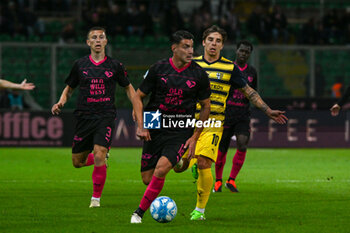 2024-04-19 - Ionut Nedelcearu (Palermo F.C.) in action against Adrian Bernabe (Parma Calcio) during the Italian Serie BKT match between Palermo F.C. vs Parma Calcio 1913 on 19th April 2024 at the Renzo Barbera stadium in Palermo, Italy - PALERMO FC VS PARMA CALCIO - ITALIAN SERIE B - SOCCER