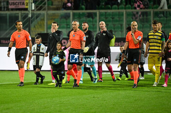 2024-04-19 - Terna referee, Palermo F.C. and Parma Calcio enters the field during the Italian Serie BKT match between Palermo F.C. vs Parma Calcio 1913 on 19th April 2024 at the Renzo Barbera stadium in Palermo, Italy - PALERMO FC VS PARMA CALCIO - ITALIAN SERIE B - SOCCER