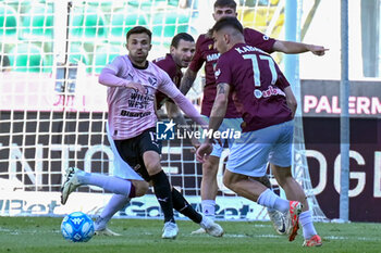 2024-04-27 - Federico Di Francesco (Palermo F.C.) and Elvis Kabashi (A.C. Reggiana 1919) during the Italian Serie BKT match between Palermo F.C. vs A.C. Reggiana 1919 on 27th April 2024 at the Renzo Barbera stadium in Palermo, Italy - PALERMO FC VS AC REGGIANA - ITALIAN SERIE B - SOCCER
