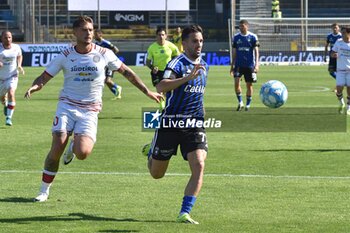 2024-05-04 - Marco D'Alessandro (Pisa) thwarted by Andrea Giorgini (Sudtirol) - PISA SC VS FC SüDTIROL - ITALIAN SERIE B - SOCCER