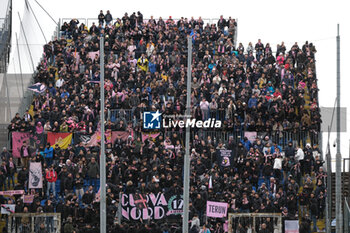 2024-03-02 - Supporters of Palermo FC during the Italian Serie B soccer championship match between Brescia Calcio and Palermo FC at Mario Rigamonti Stadium on March 02, 2024, Brixia, Italy. - BRESCIA CALCIO VS PALERMO FC - ITALIAN SERIE B - SOCCER