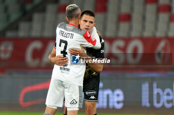 2024-04-05 - Cesar Falletti of US Cremonese and Karlo Lulic of SSC Bari - SSC BARI VS US CREMONESE - ITALIAN SERIE B - SOCCER