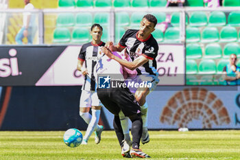 2024-05-05 - Claudio Gomes (Palermo F.C.) in action against Karim Zedadka (Ascoli Calcio) during the Italian Serie BKT match between Palermo F.C. vs Ascoli Calcio 1898 F.C. on 5th May 2024 at the Renzo Barbera stadium in Palermo, Italy - PALERMO VS ASCOLI - ITALIAN SERIE B - SOCCER