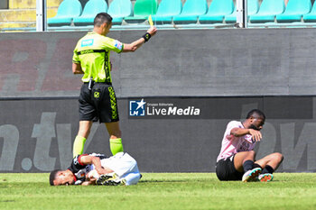 2024-05-05 - Yellow card for Salim Diakite (Palermo F.C.) during the Italian Serie BKT match between Palermo F.C. vs Ascoli Calcio 1898 F.C. on 5th May 2024 at the Renzo Barbera stadium in Palermo, Italy - PALERMO VS ASCOLI - ITALIAN SERIE B - SOCCER