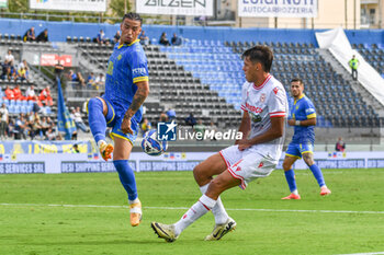 2024-09-28 - Devid Eugene Bouah (Carrarese) against Alessandro Fontanarosa (Reggiana) - CARRARESE CALCIO VS AC REGGIANA - ITALIAN SERIE B - SOCCER