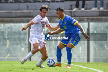 2024-09-28 - Devid Eugene Bouah (Carrarese) against Alessandro Sersanti (Reggiana) - CARRARESE CALCIO VS AC REGGIANA - ITALIAN SERIE B - SOCCER