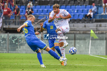 2024-09-28 - Hjortur Hermannsson (Carrarese)
 against Manolo Portanova (Reggiana) - CARRARESE CALCIO VS AC REGGIANA - ITALIAN SERIE B - SOCCER