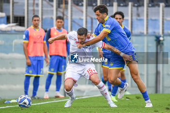 2024-09-28 - Riccardo Fiamozzi (Reggiana) against Samuel Giovane (Carrarese) - CARRARESE CALCIO VS AC REGGIANA - ITALIAN SERIE B - SOCCER