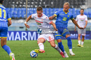 2024-09-28 - Luca Vido (Reggiana) against Giuseppe Antonio Panico (Carrarese) - CARRARESE CALCIO VS AC REGGIANA - ITALIAN SERIE B - SOCCER