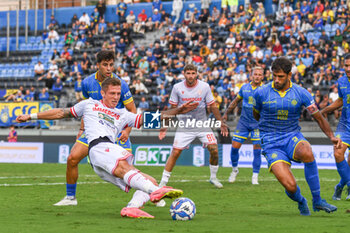 2024-09-28 - Luca Vido (Reggiana) shots on goal against Marco Imperiale (Carrarese) - CARRARESE CALCIO VS AC REGGIANA - ITALIAN SERIE B - SOCCER