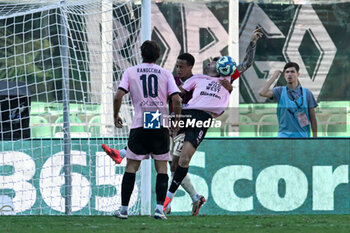 2024-10-06 - Lilian Njoh (Salernitana) in action against Matteo Brunori (Palermo F.C.) during the Italian Serie BKT match between Palermo F.C. vs Salernitana 6th October 2024 at the Renzo Barbera stadium in Palermo, Italy - PALERMO FC VS US SALERNITANA - ITALIAN SERIE B - SOCCER