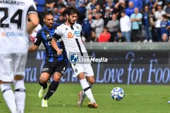 2024-10-05 - Cristian Shpendi (Cesena) thwarted by Antonio Caracciolo (Pisa) - AC PISA VS CESENA FC - ITALIAN SERIE B - SOCCER