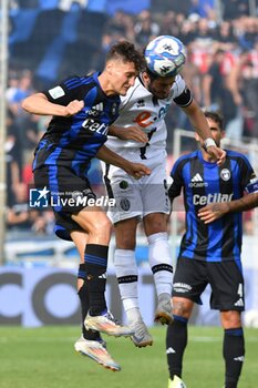 2024-10-05 - Gabriele Piccinini (Pisa) and Cristian Shpendi (Cesena) head tackle - AC PISA VS CESENA FC - ITALIAN SERIE B - SOCCER