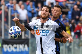 2024-10-05 - Simone Bastoni (Cesena) and Adrian Rus (Pisa) fight for the ball - AC PISA VS CESENA FC - ITALIAN SERIE B - SOCCER