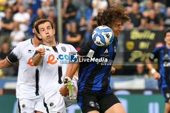 2024-10-05 - Massimiliano Mangraviti (Cesena) and Alexander Lind (Pisa) fight for the ball - AC PISA VS CESENA FC - ITALIAN SERIE B - SOCCER