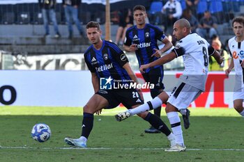 2024-10-05 - Saber Hraiech (Cesena) thwarted by Oliver Abildgaard Nielsen (Pisa) - AC PISA VS CESENA FC - ITALIAN SERIE B - SOCCER