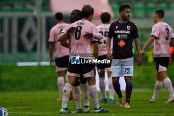 2024-10-26 - Jacopo Segre (Palermo F.C.) hugs Claudio Gomes (Palermo F.C.) after win the Italian Serie BKT match between Palermo F.C. vs A.C. Reggiana 1919 on 26th October 2024 at the Renzo Barbera stadium in Palermo, Italy - PALERMO FC VS AC REGGIANA - ITALIAN SERIE B - SOCCER