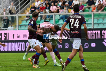 2024-10-26 - Manolo Portanova (A.C. Reggiana 1919) in action against Jeremy Le Douaron (Palermo F.C.) during the Italian Serie BKT match between Palermo F.C. vs A.C. Reggiana 1919 on 26th October 2024 at the Renzo Barbera stadium in Palermo, Italy - PALERMO FC VS AC REGGIANA - ITALIAN SERIE B - SOCCER