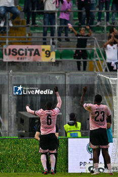 2024-10-26 - Claudio Gomes (Palermo F.C.) and Salim Diakite (Palermo F.C.) greets the fans at the end of the match of the Italian Serie BKT match between Palermo F.C. vs A.C. Reggiana 1919 on 26th October 2024 at the Renzo Barbera stadium in Palermo, Italy - PALERMO FC VS AC REGGIANA - ITALIAN SERIE B - SOCCER