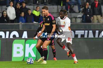 2024-10-30 - Oliver Abildgaard Nielsen (Pisa) thwarted by Mamadou Coulibaly (Catanzaro) - AC PISA VS US CATANZARO - ITALIAN SERIE B - SOCCER