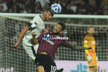 2024-10-29 - Giuseppe Prestia of Cesena FC competes for the ball with Ernesto Torregrossa of US Salernitana 1924 during the Soccer BKT between US Salernitana 1919 vs Cesena FC at Arechi Stadium - US SALERNITANA VS CESENA FC - ITALIAN SERIE B - SOCCER